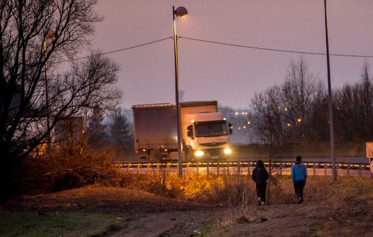 Calais: Van driver killed in crash caused by migrants' motorway road block