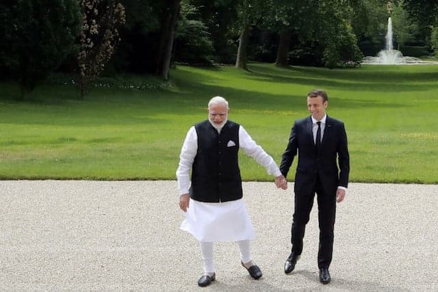 Modi tells Macron India will 'go beyond' Paris climate accord