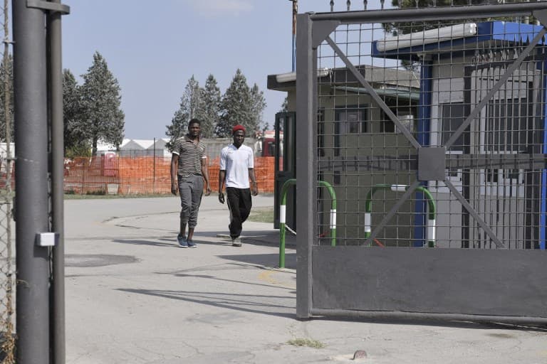 Quiet Italy hamlets struggle with migrant 'human warehouses'