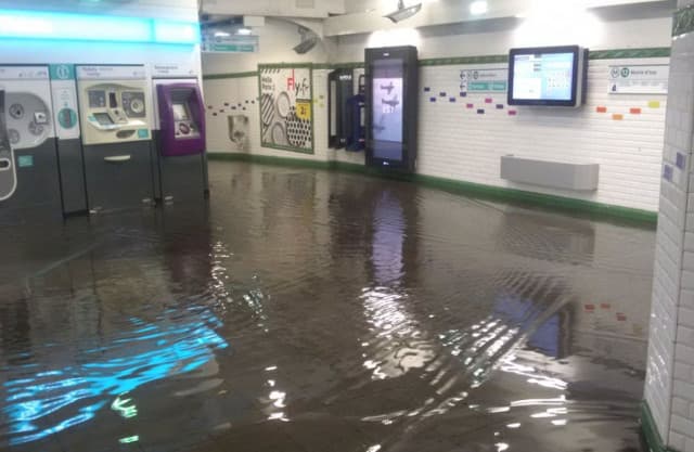 Torrential rain pounds Paris leaving Metro stations and roads flooded