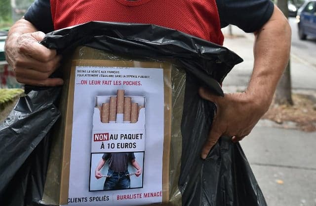 French tobacconists rebel against plan to hike price of cigarettes to €10