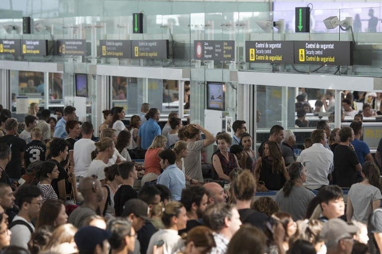 Hellish delays at Barcelona airport as security staff stage strike