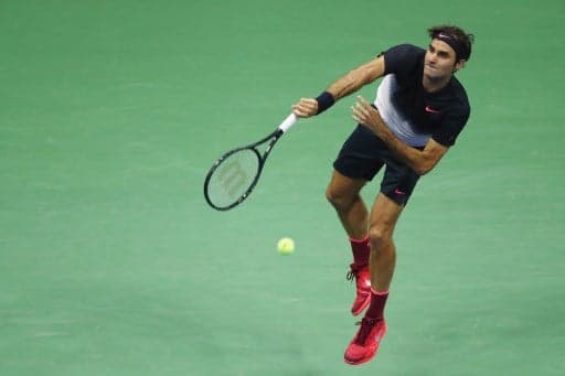 Federer sets up quarterfinal showdown with Del Potro