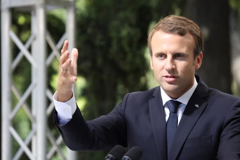 France's Macron hits at radicals with 'lazy, cynics' jibe
