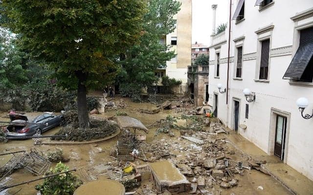 Italy floods: Death toll rises to eight as body of final missing person found