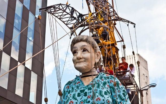 Eight-metre giant marionettes on parade in Geneva