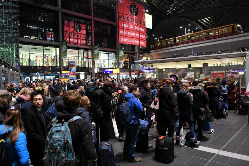 Queues snake through Berlin central station as train standstill continues
