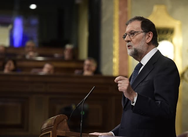 Spain threatens to suspend Catalonia's autonomy unless Puigdemont backs down