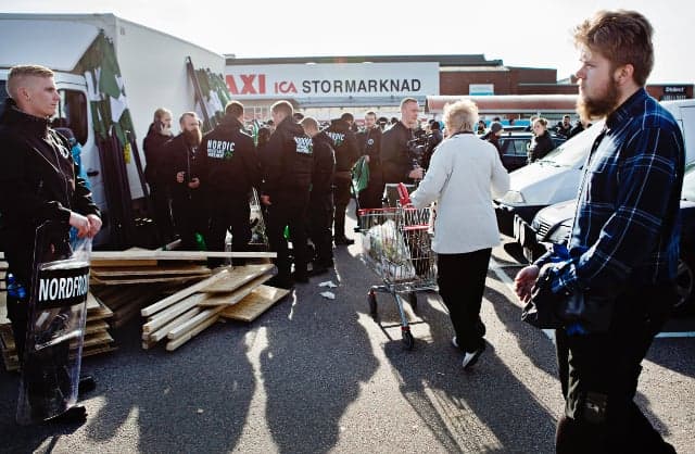 Watch: Elderly Swedish shopper totally undeterred by neo-Nazis