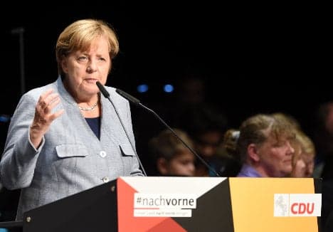 Merkel faces test in state vote before tough coalition talks