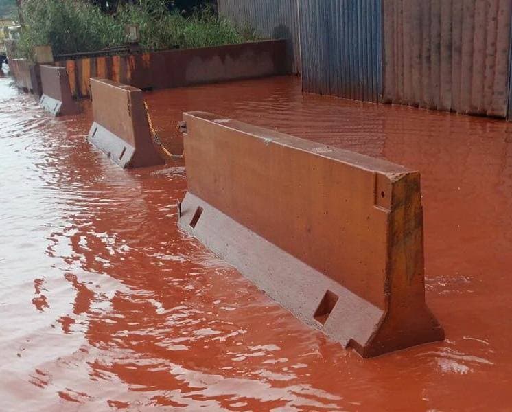 Activists demand action as water runs red near Italian steelworks