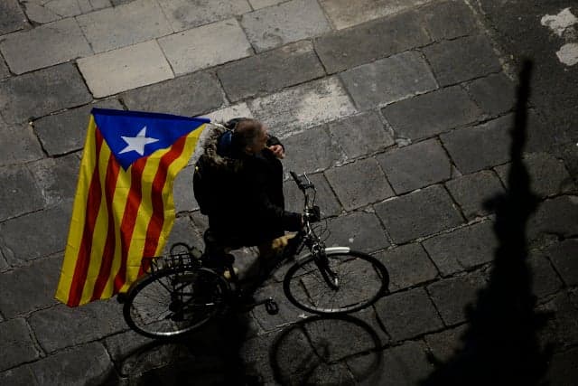 Ousted Catalan government ditches unilateral independence push