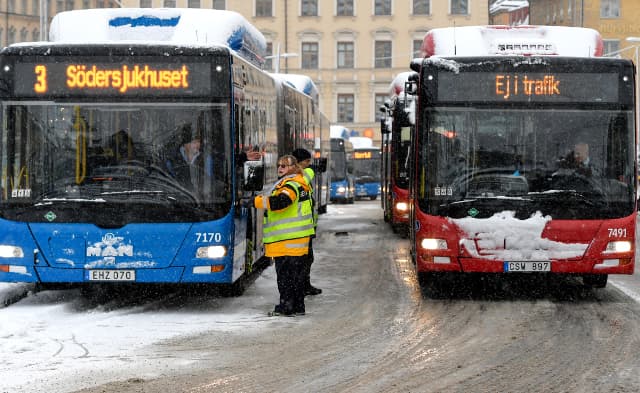 Traffic chaos arrives with first snow in Stockholm: in pictures