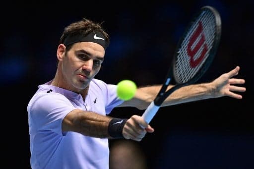 Federer reaches semifinals in London and becomes world's highest earning athlete