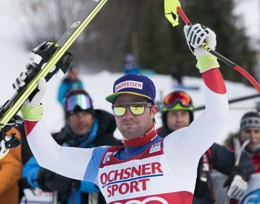 Swiss ski champ Feuz wins season opener in Canada