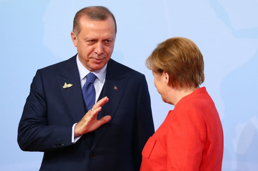 Erdogan holds out olive branch to Germany after fractious year