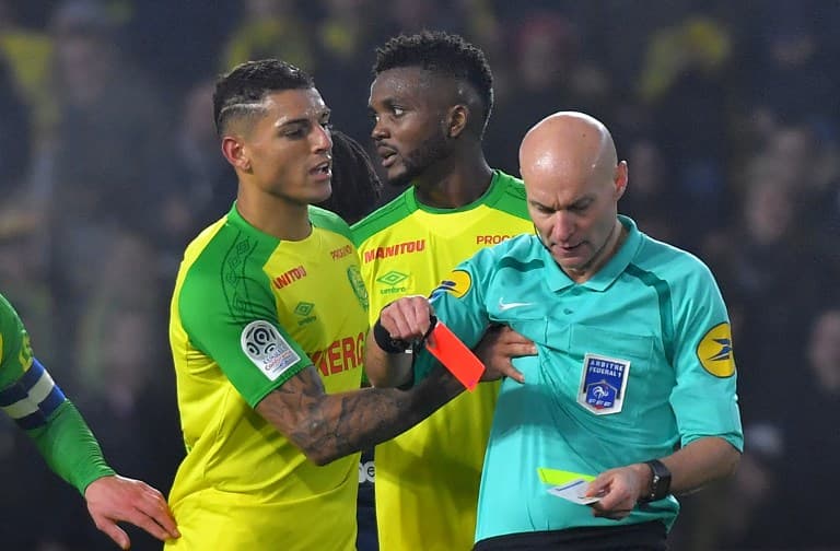 'It was clumsy': French referee sorry for kicking out at footballer