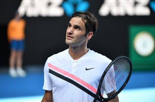 Federer powers into quarterfinal down under