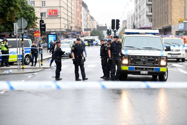 Man faces trial over knife attack on Stockholm police officer