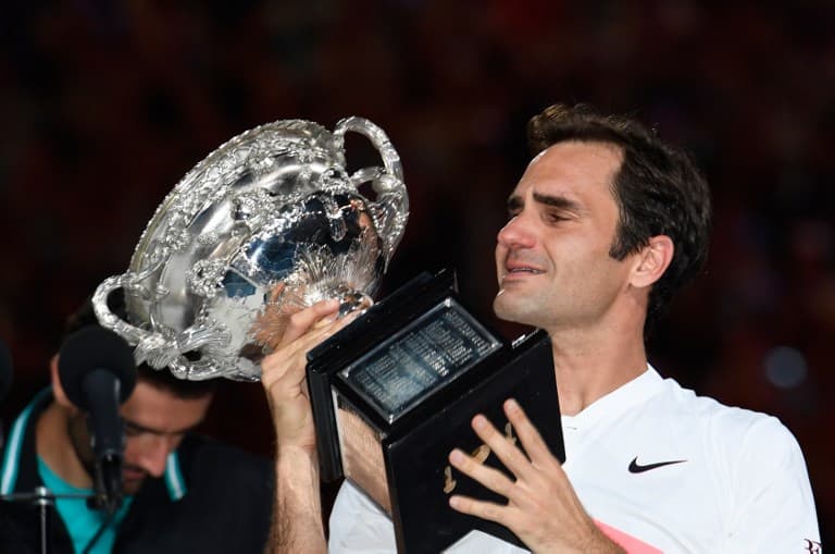 Tearful Federer wins Australian Open for 20th Slam title