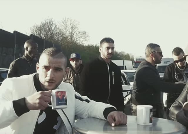 French rapper sentenced for blocking motorway with restaurant table and chairs