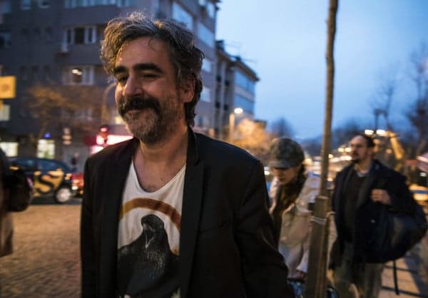 Freed German-Turkish journalist says Ankara held him 'hostage'