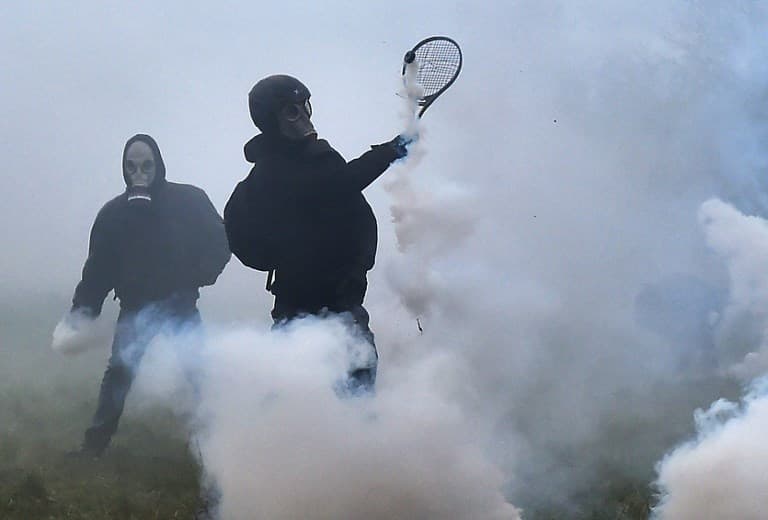 Tennis rackets against tear gas: Battle continues at French protest camp