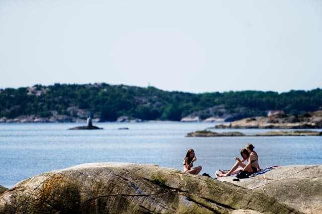 Swedes bask in sunshine on hottest day of the year