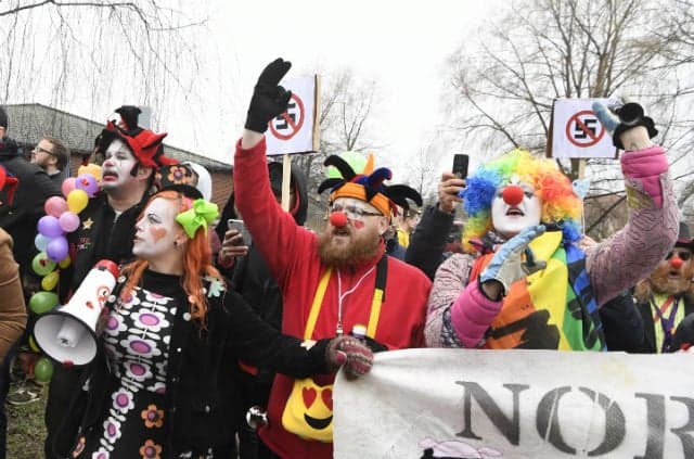 Clown faces fine for protesting neo-Nazi march