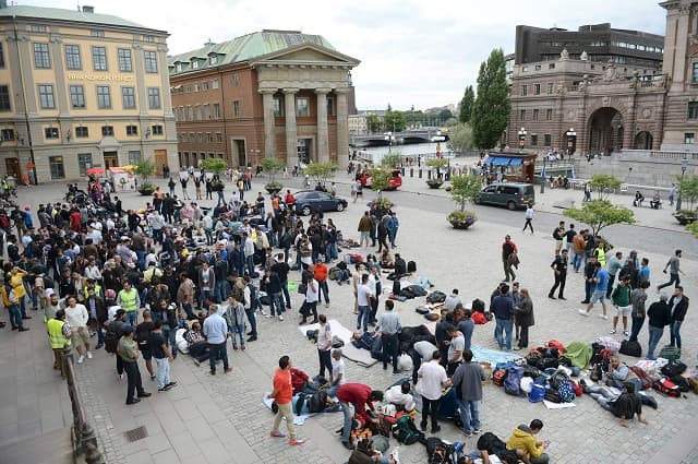Swedish parliament gives 1000s of young asylum seekers a chance to stay