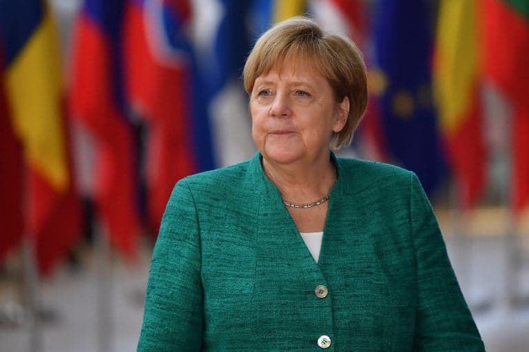 Embattled Merkel draws up new measures to tackle migration