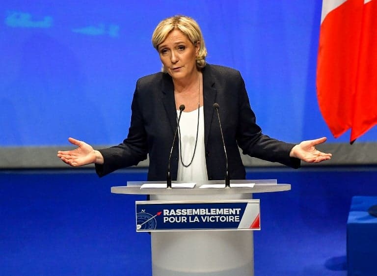 France's Le Pen demands cross-party support after funds seized