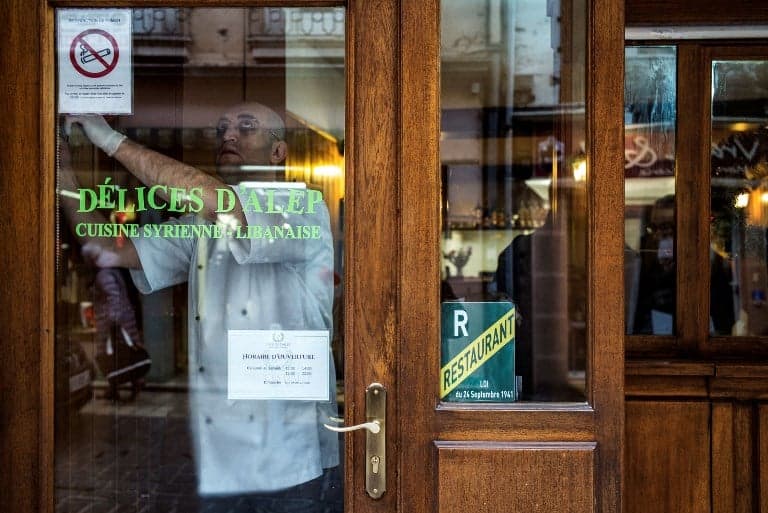 French restaurants turn to undocumented migrants to fill 130,000 vacant jobs