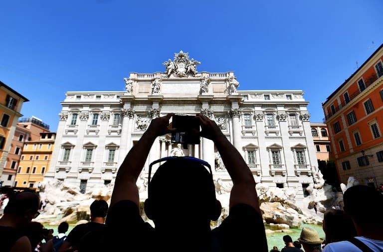 From selfie brawls to midnight swims: Tourists behaving badly at Rome's Trevi Fountain