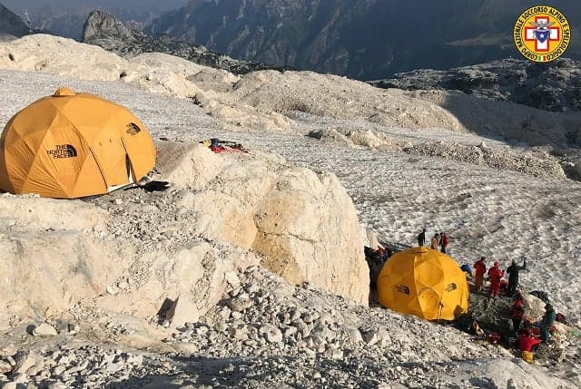 Italian rescuers save injured potholer in two-day 'difficult operation'