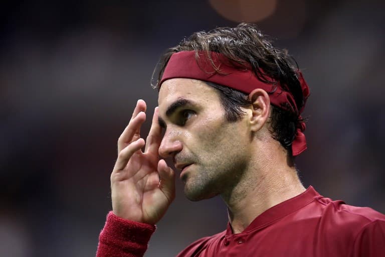 Five-time champion Federer knocked out of US Open by Aussie Millman