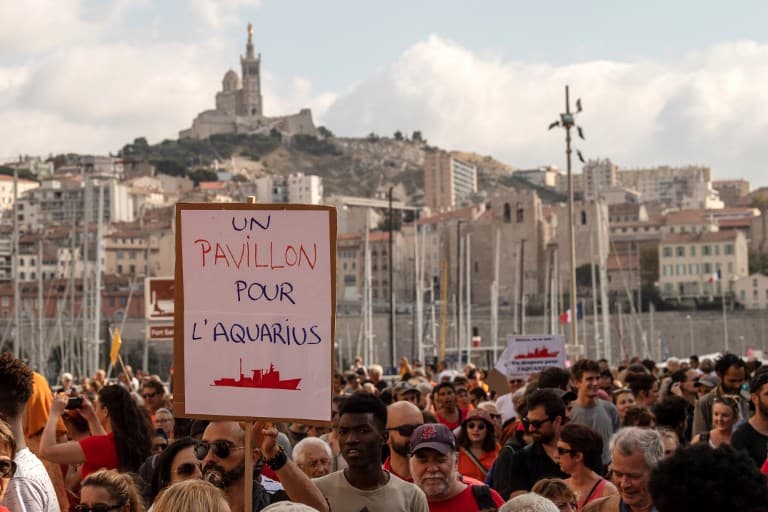 Thousands gather across Europe to back migrant rescue ship stuck in Marseille port
