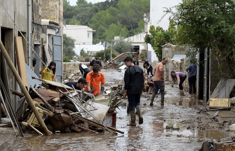 IN PICS: Smashed cars, strewn furniture and inches of mud after Mallorca floods