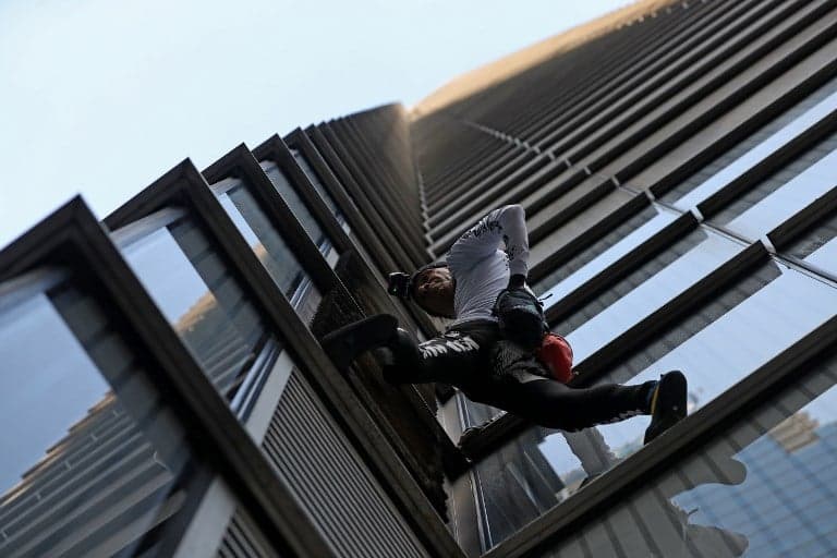 In images: 'French Spiderman' tower stunt grinds London's financial hub to halt