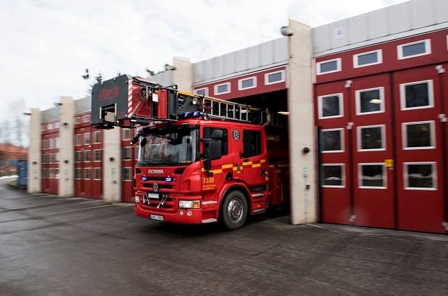 Stockholm firefighters tackle bus depot blaze