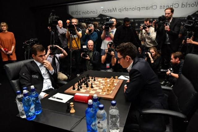 Norway's Carlsen ends chess game with dramatic draw