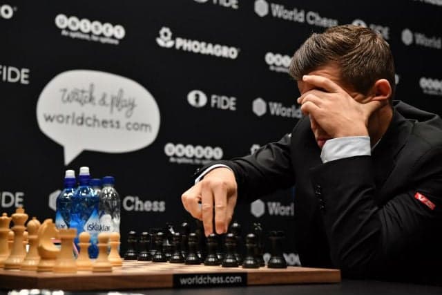 Norway's Carlsen draws again in World Championship second round