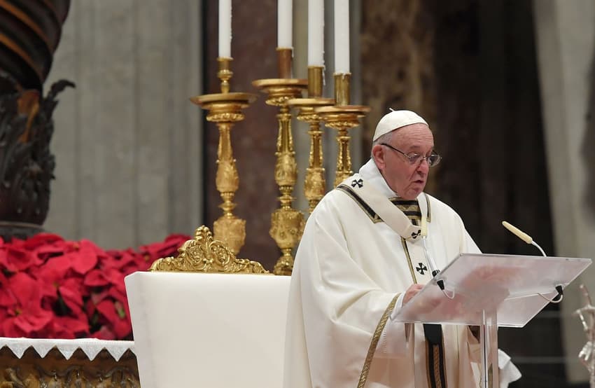 Pope urges more 'sharing and giving' in Christmas mass