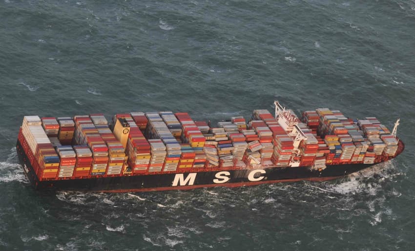 Ship loses cargo in storm, as clean up begins after flooding in northern Germany