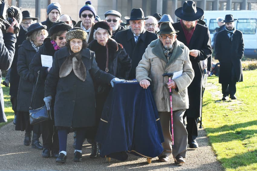 Holocaust victims killed at Auschwitz laid to rest in Britain