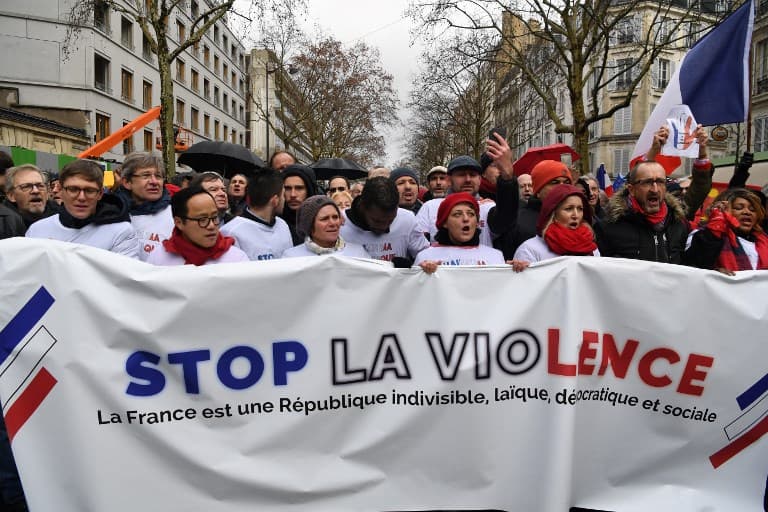 'We're the people too': 10,000 'red scarves' march in Paris against yellow vest 'revolution'