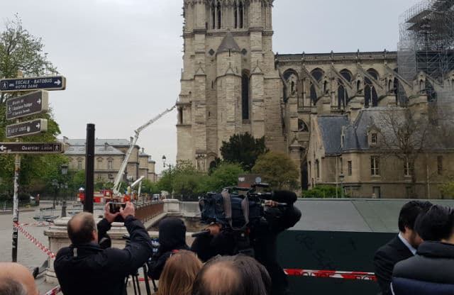 'The church is burning and the whole world is crying' - Parisians mourn for Notre-Dame