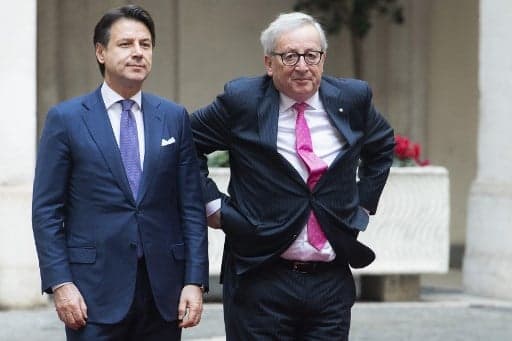 Juncker warns Italian government over its struggling economy