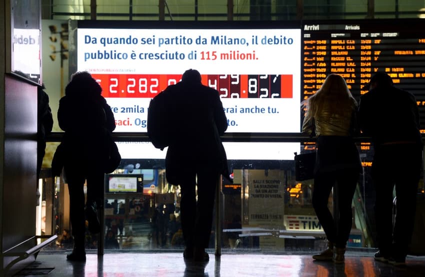EU warns Italy over its soaring debt