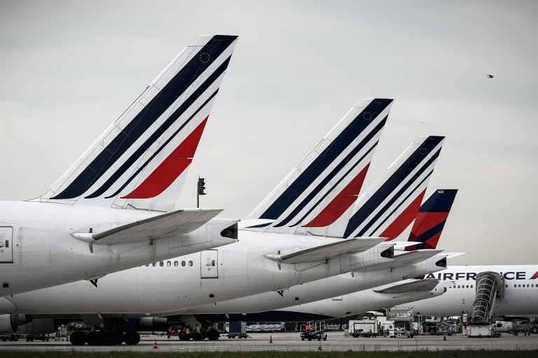 Hundreds of flights cancelled in France as air traffic controllers go on strike